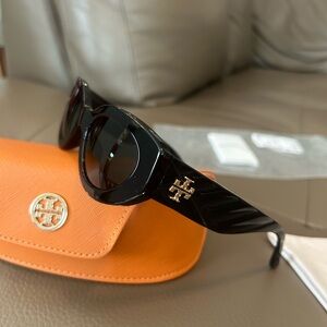 Tory Burch brand new sunglasses. Never worn. Excellent condition.